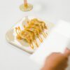 PLAYTS vierkant creme kleurig met gyozas erop