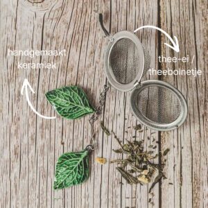 Alternative view of Thee-ei met groene blaadjes van keramiek | handgemaakt